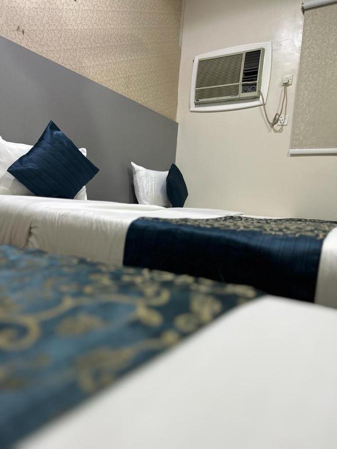 Asfar Al-Waha Aparthotel Mecca Bagian luar foto